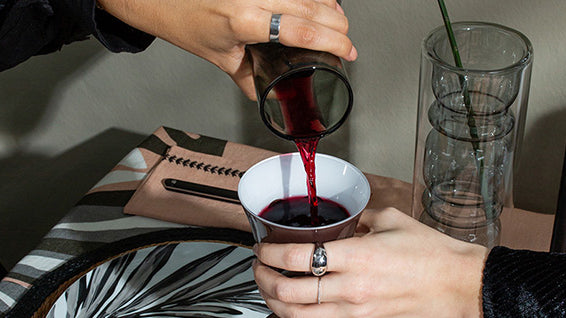 romantic dinner table at home with wine and candle